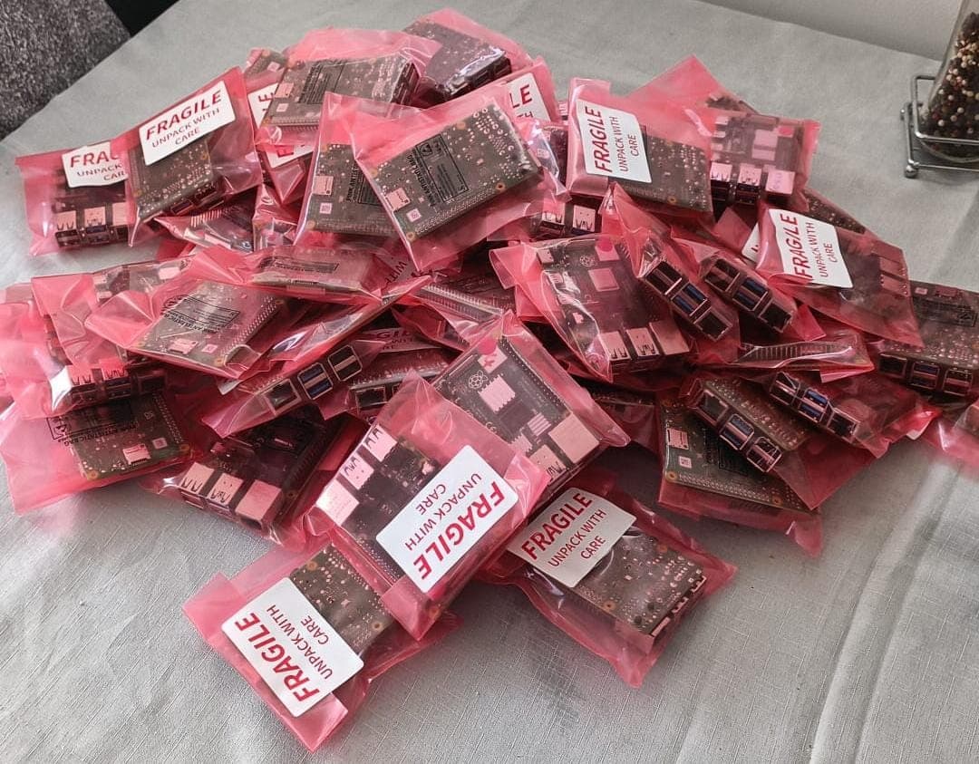 Tray of mixed Raspberry Pi test boards from factory surplus, various models and visible wear