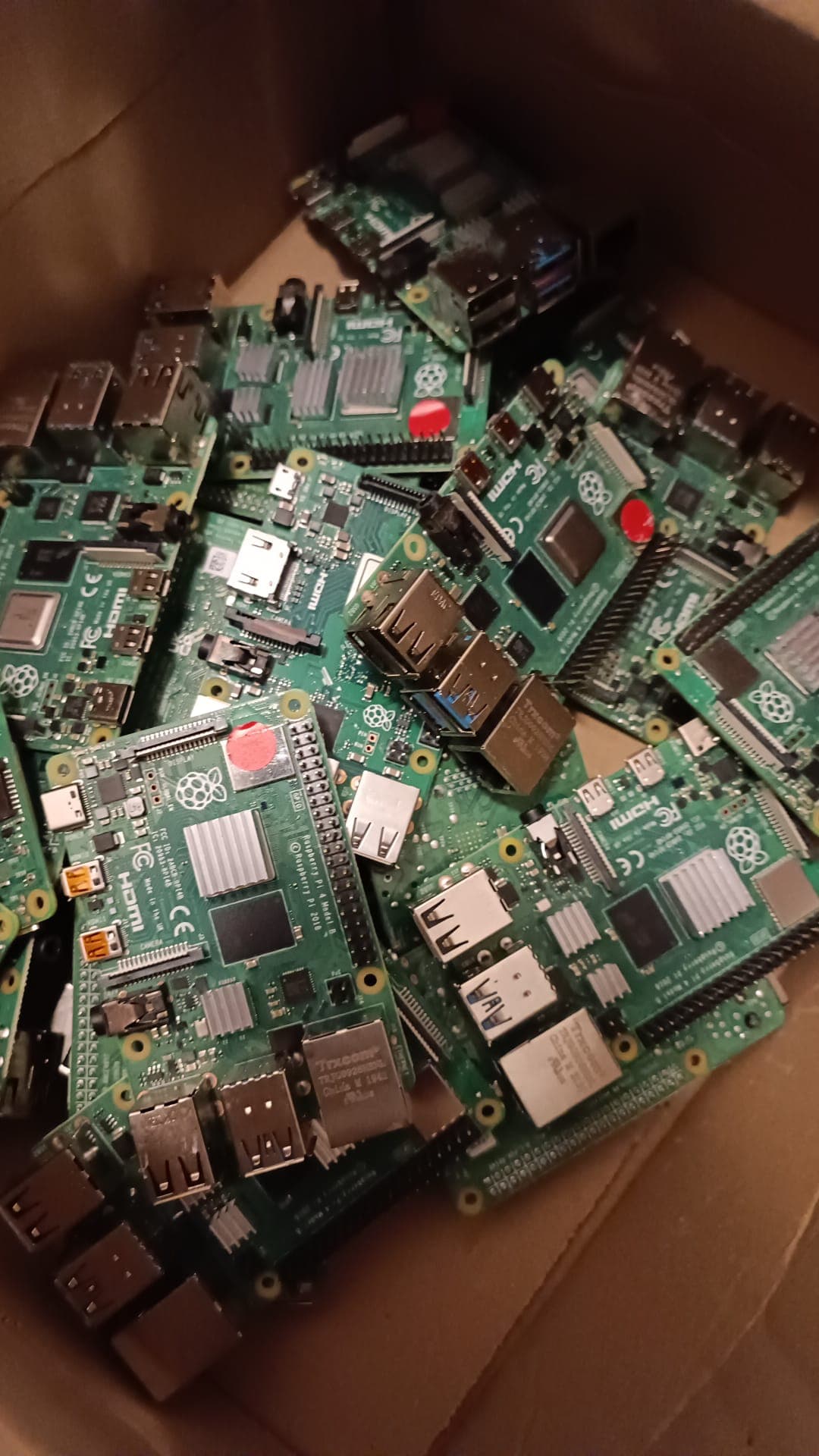 Tray of approximately 200 Raspberry Pi boards returned through aftermarket channels